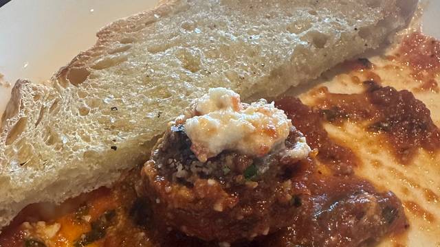 Cansano Italian Steakhouse signature dishes 8 oz Filet MignonPappardelle BologneseVeal Chop
